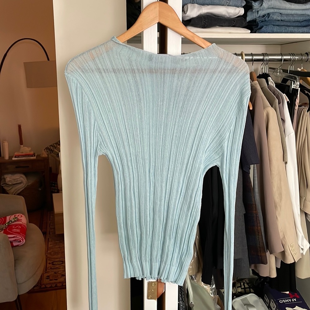 Lionness mock neck ribbed top